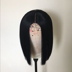 Black synthetic wig.